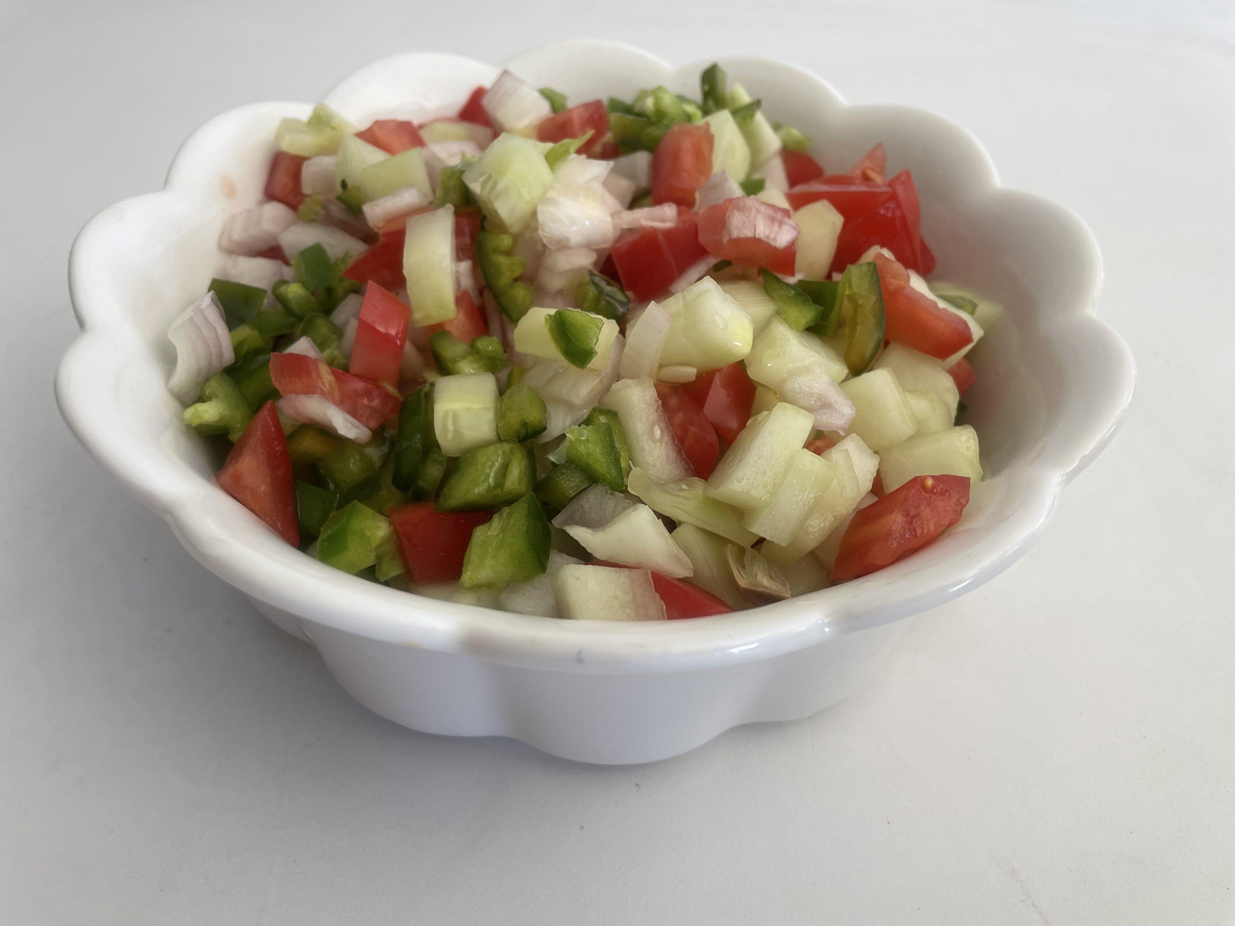 Refreshing cucumber tomato and onion salad
